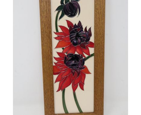 Moorcroft framed wall plaque in the ruby red pattern, 30 x 9 cm. P&amp;P Group 2 (£18+VAT for the first lot and £3+VAT for su