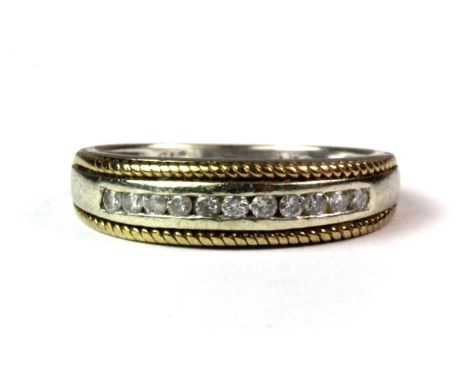 A 9ct yellow gold diamond set half eternity ring (K.5).