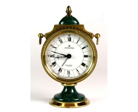 A Hamilton gilt metal alarm clock, H. 12cm.