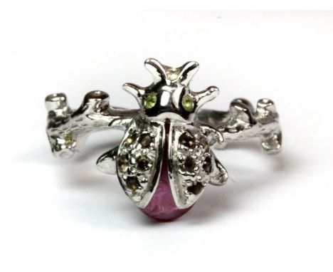 A 925 silver ladybird shaped ring set with sapphires and a ruby (Q).