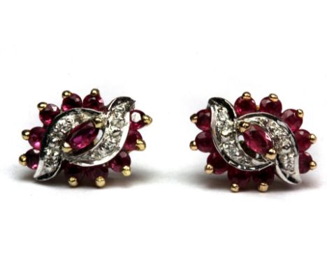 A pretty pair of 9ct yellow gold (stamped 375) ruby and diamond set earrings.