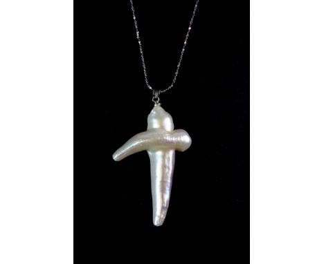 A 925 silver pendant and chain set with a baroque pearl cross.