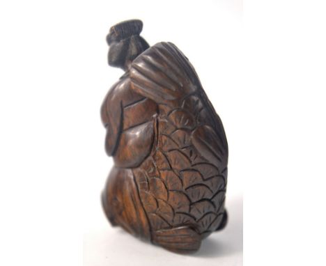 Wooden Netsuke of Japanese lady and a fish approx 5cm tall