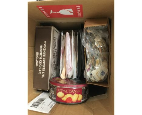 A box containing a large quantity of mixed stamps to include Royal Mint unused presentation packs and First Day Covers.