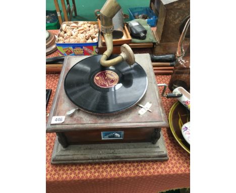 An early 20th century His Masters Voice oak cased wind-up record player.