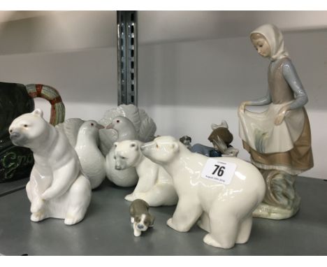 A collection of various Lladro china items including a Young Girl and a Rabbit, a set of three Polar Bears, Young Girl playin