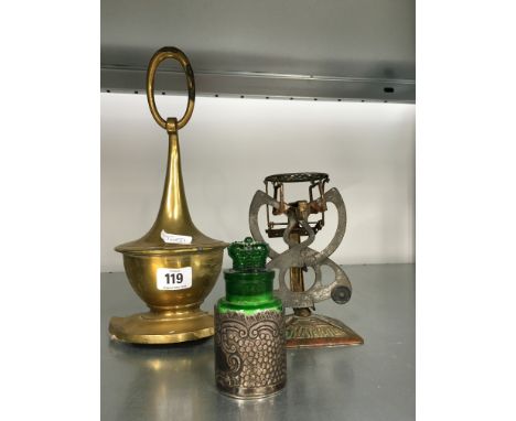 A silver mounted green glass smelling salts bottle with Crown stopper together with a brass door stop and Art Nouveau set of 