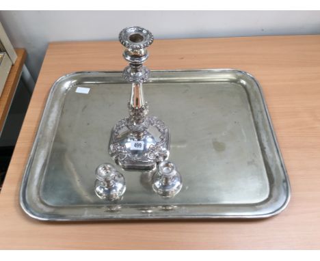 A pair of silver dwarf candlesticks together with a heavy silver plated candlestick with all-over floral embossed decoration 