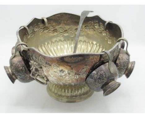 C20th EPNS circular punch bowl with garlands of repousse flowers, shaped gadrooned rim and lion mask ring handles on a circul