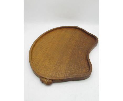 Robert Mouseman Thompson of Kilburn - an adzed oak kidney shaped galleried tray, carved with two signature mouse handles, W47