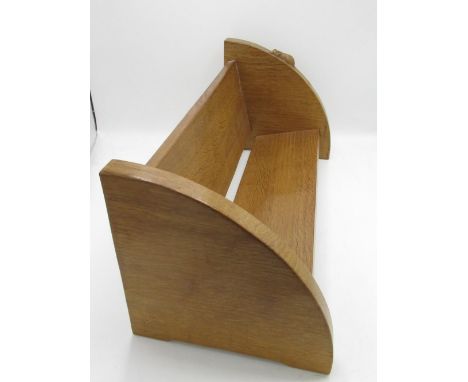 Robert Mouseman Thompson of Kilburn - an adzed oak book trough, down curved ends carved with signature mouse, W45cm D21cm H20