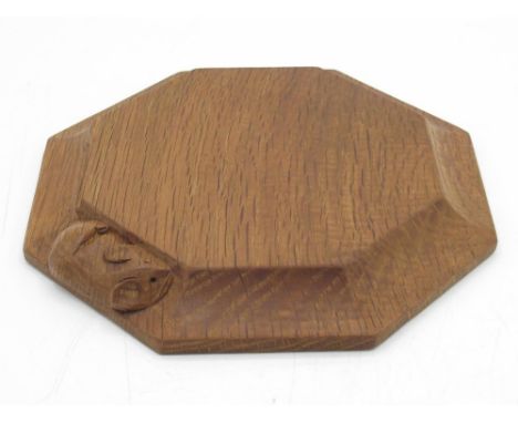 Robert Mouseman Thompson of Kilburn - an oak octagonal tea pot stand, carved with signature mouse, D20cm 