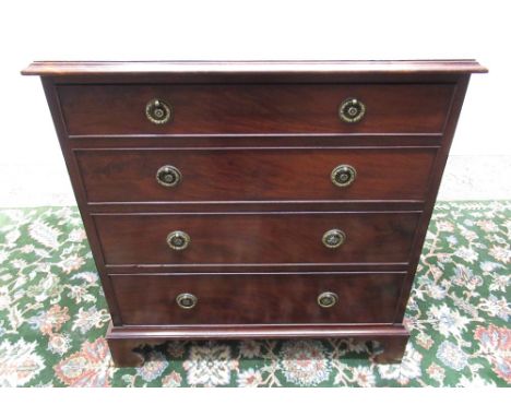 Small C19th mahogany chest, moulded top and four cockbeaded drawers with brass ring handles on shaped bracket feet, W62cm D42