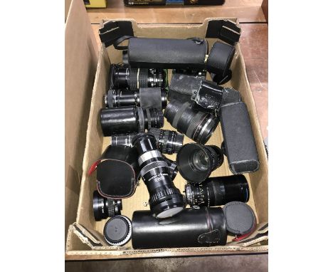 Tray of 35mm camera lenses to include, Pentax, Praktica and Optomax etc