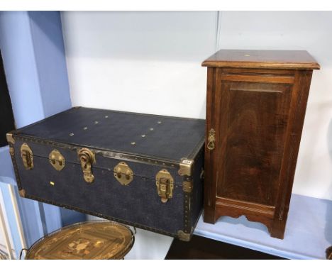 A blue trunk and a pot cupboard