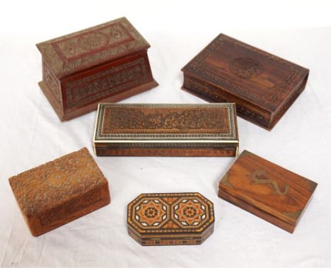 SIX EASTERN WOODEN JEWELLERY/TRINKET BOXES
carved and inlaid examples, shapes and sizes vary