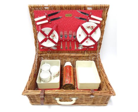 BREXTON WICKER PICNIC HAMPER
fitted with four plates, four saucers and three cups, four sets of cutlery, flask and plastic fo