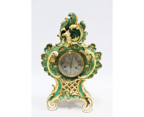Rococo style mantle clock with silvered dial and Roman numerals, (a/f) 