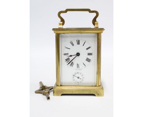 French carriage clock of small proportions,  complete with key, 13cm high including handle 