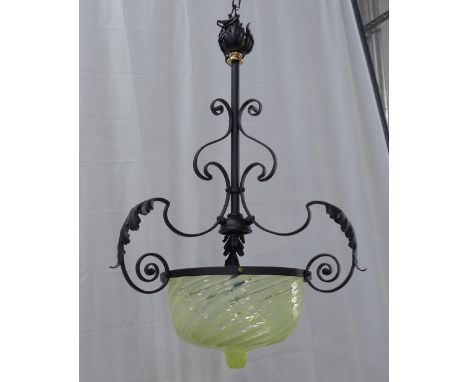 Ceiling light with a Vaseline glass shade fitted in a later black metal frame, 70 x 42cm 