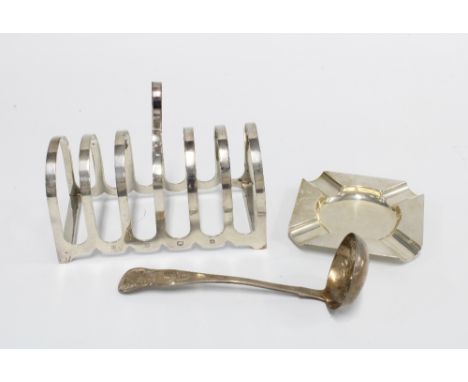 A silver toast rack, Sheffield 1972,  a Mappin &amp; Webb silver ashtray, London 1945 and a william IV Scottish sifter sauce 