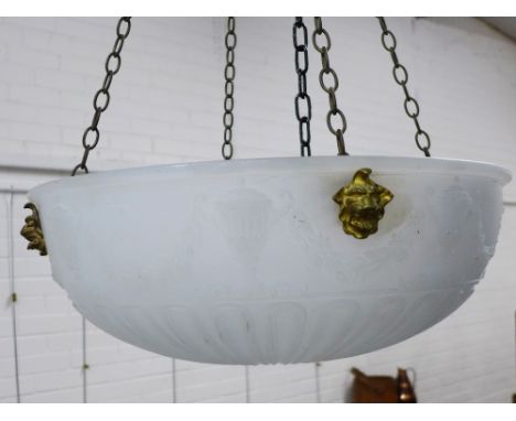 Early 20th century opaque glass ceiling light with gilt metal lion heads and moulded classical urn design, with three hanging