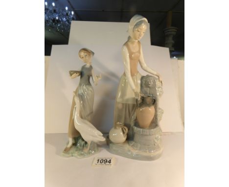 A LLadro figure of a lady feeding a goose and a NAO figure of a lady collecting water