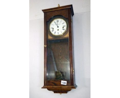 An oak wall clock
