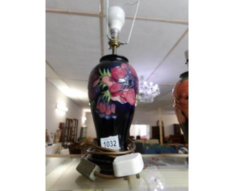 A dark blue Moorcroft anemone table lamp base