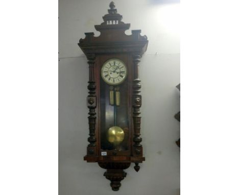 A Victorian mahogany double weight Vienna wall clock