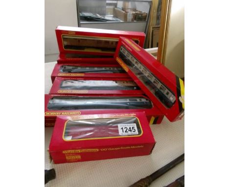 6 boxed Hornby railways '00' gauge carriages and a boxed R.344 track cleaning car