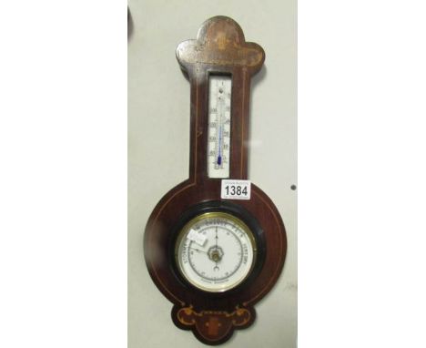 An oak cased barometer with marquetry inlay
