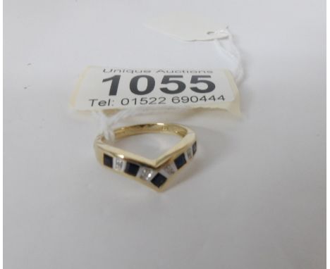 A yellow gold diamond and sapphire wishbone ring, size L