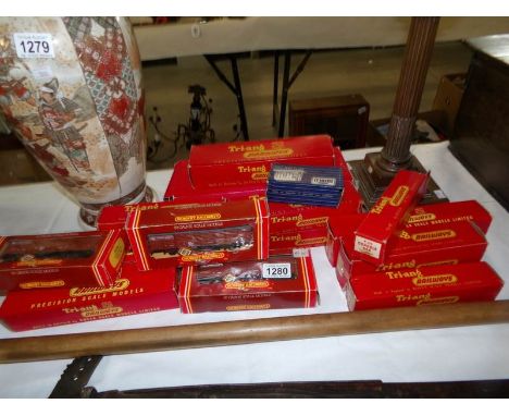 15 boxed Hornby Triang rolling stock including R.235 Pulp wood car, R.739 operating break down crane etc