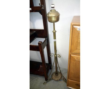 A Victorian brass standard lamp