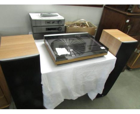 A Bang and Olufsen Beogram 6000 record player with speakers - Quad 306 power amp. - Quad FM4 tuner - Quad 34 control unit - B