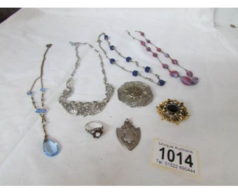 A mixed lot of costume jewellery including silver ring and silver fob