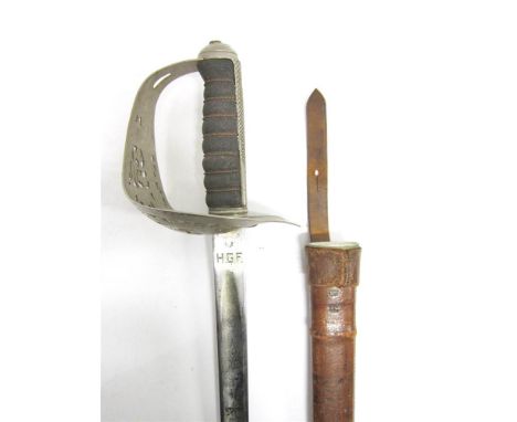 A BRITISH 1897 PATTERN INFANTRY OFFICER'S SWORD the 83cm engraved blade engraved with the personal initials 'H.G.F.' at the r