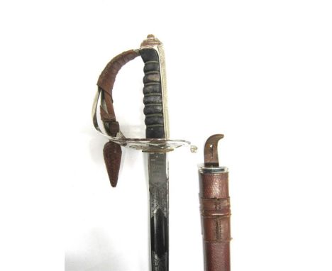 A BRITISH 1854 PATTERN WELSH GUARDS OFFICER'S SWORD by Edward Smith, the 82.5cm engraved blade marked at the ricasso 'Edward 