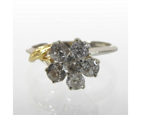 A 14 carat white gold diamond cluster ring, approximately 1.0 carats overall