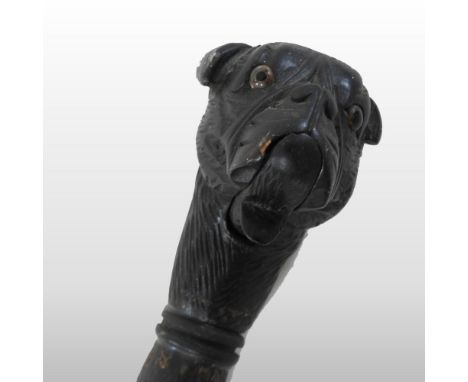 An early 20th century novelty walking stick, the handle in the form of a bulldog, with glass eyes and articulated mouth, havi