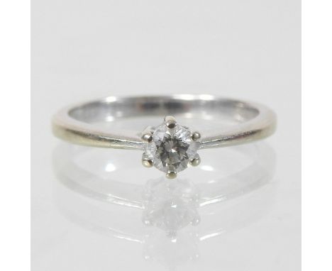 An 18 carat white gold diamond solitaire ring, approximately 0.25 carats overall