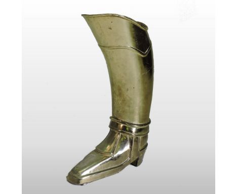 A brass novelty stick stand, in the form of a boot, 57cm high