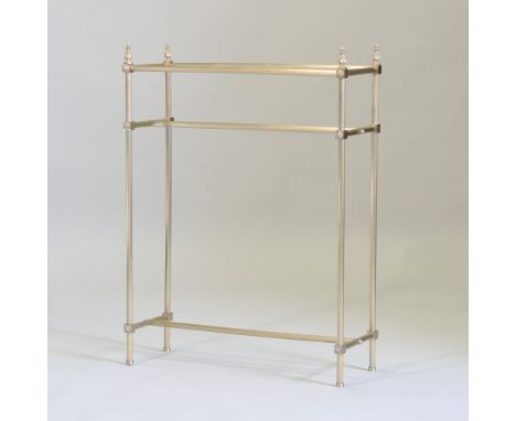 A solid brass stick stand, with reeded columns and turned finials, 86cm