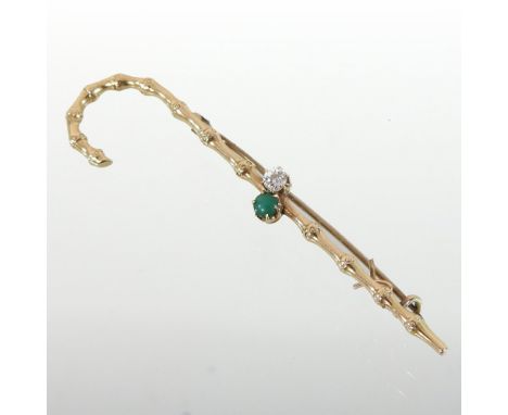 A Victorian 15 carat gold novelty brooch, in the form of a walking cane, set with jade and diamond, boxed