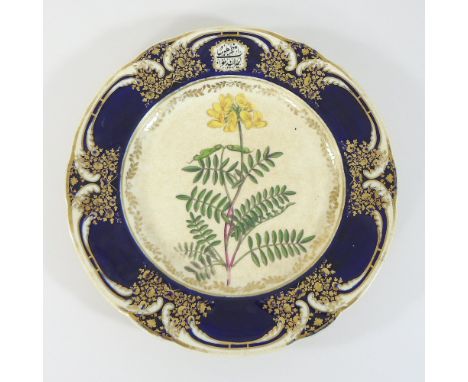 An early 19th century Chamberlain's Worcester porcelain botanical dessert plate, from the Carnatic service, painted with Hors