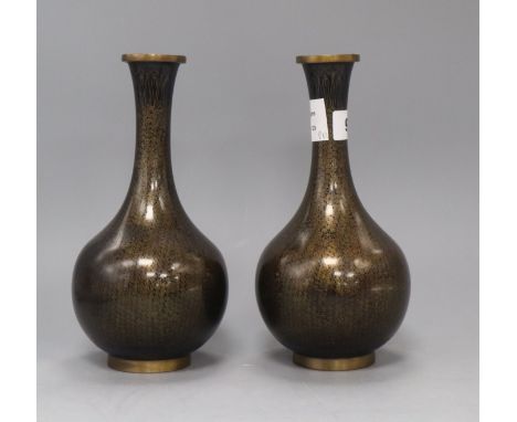 A pair of Chinese black ground cloisonne enamel bottle vases, mid 20th century height 24cm