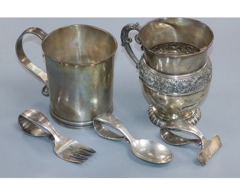 Two Tiffany &amp; Co sterling mugs including a reproduction original by John Dixwell, Boston and a Tiffany &amp; Co sterling 