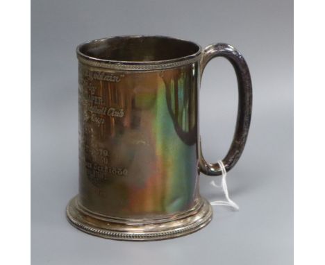 A late Victorian silver presentation mug with engraved inscription, William &amp; John Barnard, London, 1878, 9 oz.