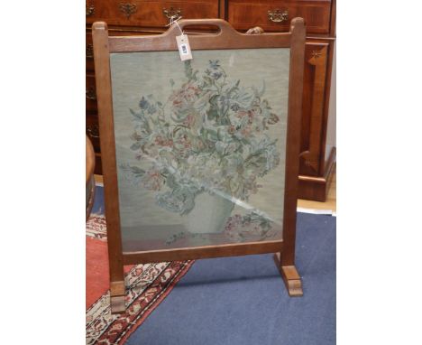 A Robert Thompson 'The Mouseman' oak fire screen H.86cm